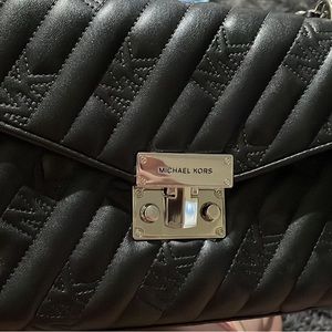 Michael Kors black purse, never used. Bought for 400